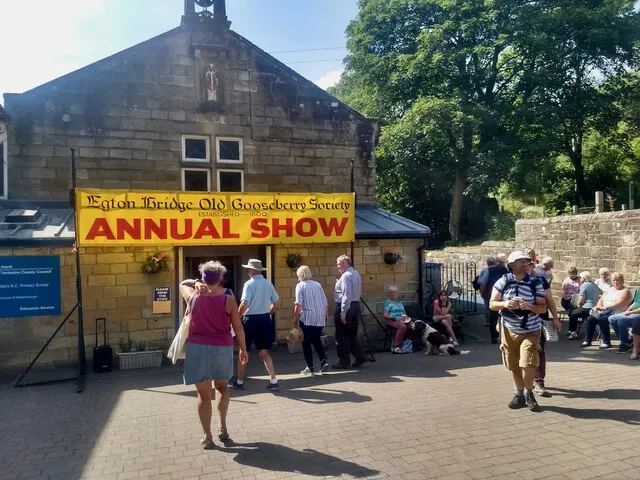 Visitors gather outside the Egton Bridge Old Gooseberry Society's Annual Show building on the day of the show.