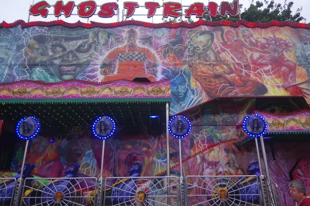 The illuminated Ghost Train ride at Nottingham's Goose Fair on the Forest Recreation Ground.