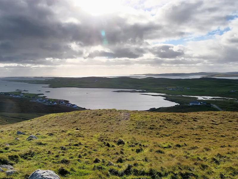 Photo of Whiteness Voe, a long sea inlet in Shetland, seen from the hill above